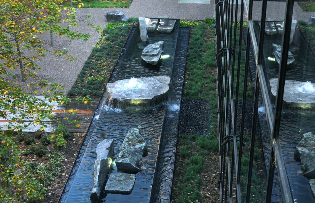 Negative edge water feature with art stones