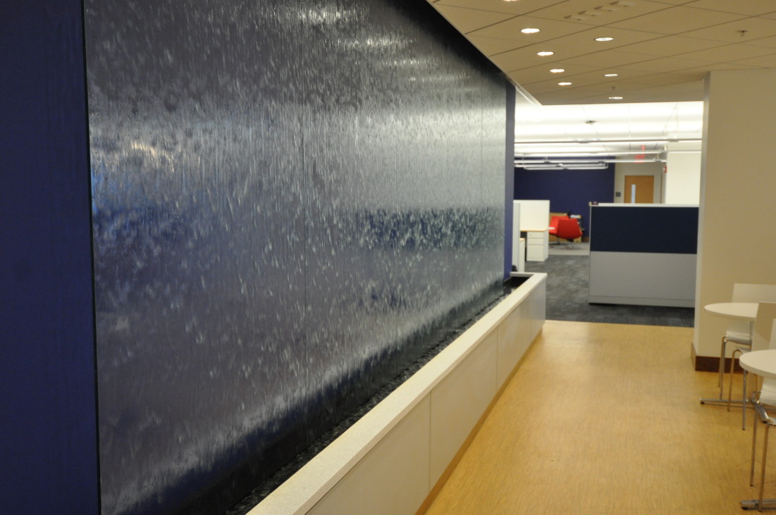 Glass water wall in employee lounge, NetBrain Technologies, Burlington, MA.