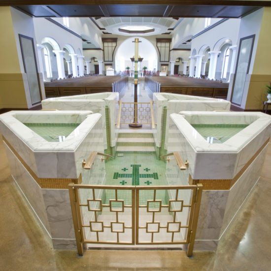 Octagonal Baptismal Font with Four Triangular Upper Bowls with Spillways and Descending and Ascending Steps into a Cruciform Lower Pool, St. Eugene, Oklahoma City, OK.